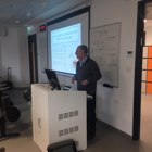 פרופ' יורם עדן בהרצאה על קריסת חברת אנרון