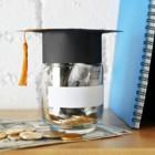 Glass Jar With Money Education Books Notepads Wooden Shelf